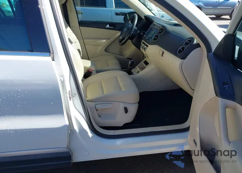 2014 Volkswagen Tiguan Sel z USA, uszkodzony, nr VIN WVGAV3AX2EW557592